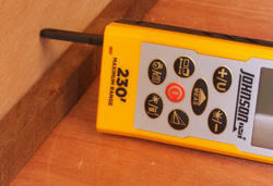 The Johnson Laser Distance Measure features an extension that flips out from the bottom of the unit to perform measurements in awkward positions.