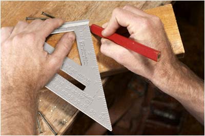 Rafter square being used on 2x4